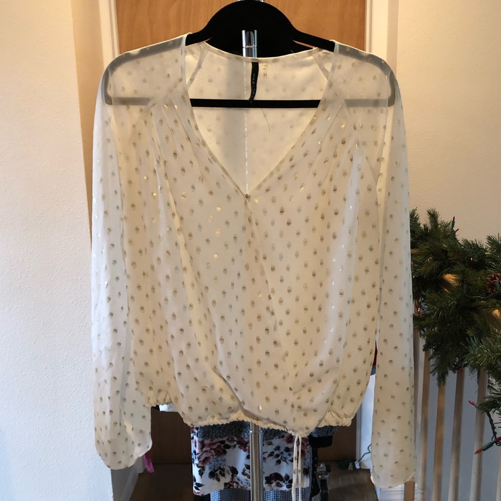 White and gold bell sleeve top